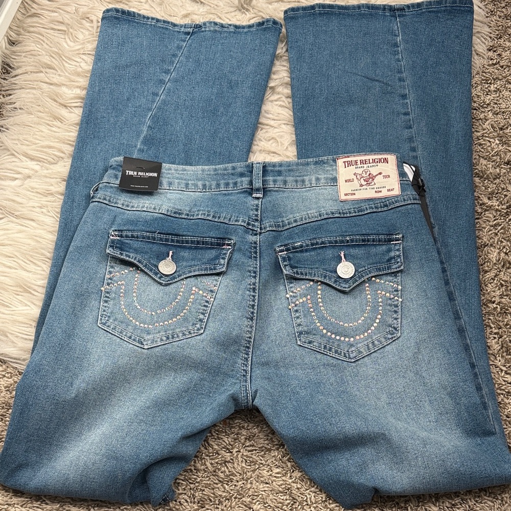 NWT True Religion Light Blue Denim with Embellished Pockets. Crystals on pockets